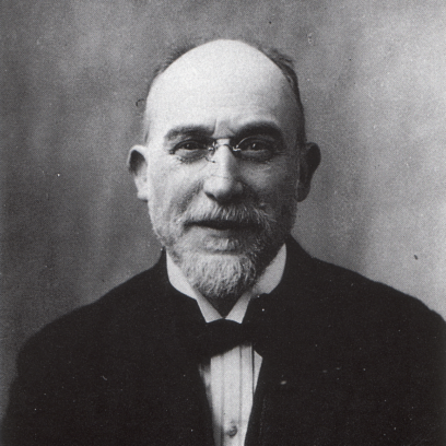 Portrait ancien, en noir et blanc, d'un homme en costume portant des lunettes, une barbe et ayant le crâne - Agrandir l'image, fenêtre modale